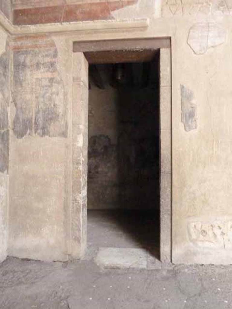 III.11 Herculaneum. May 2010. Doorway to room 4, on south side of atrium in south-east corner.
